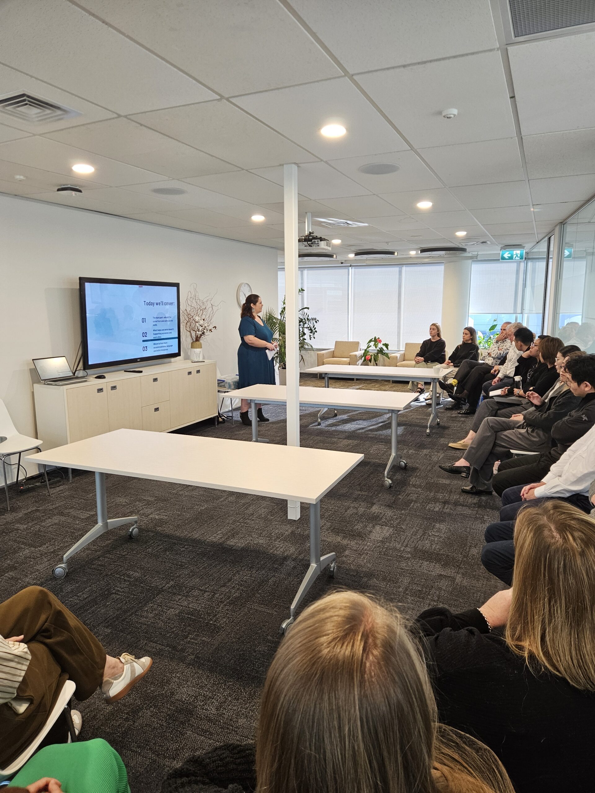 Katie is presenting her lunch and learn workplace training to a team of accountants at RSM.